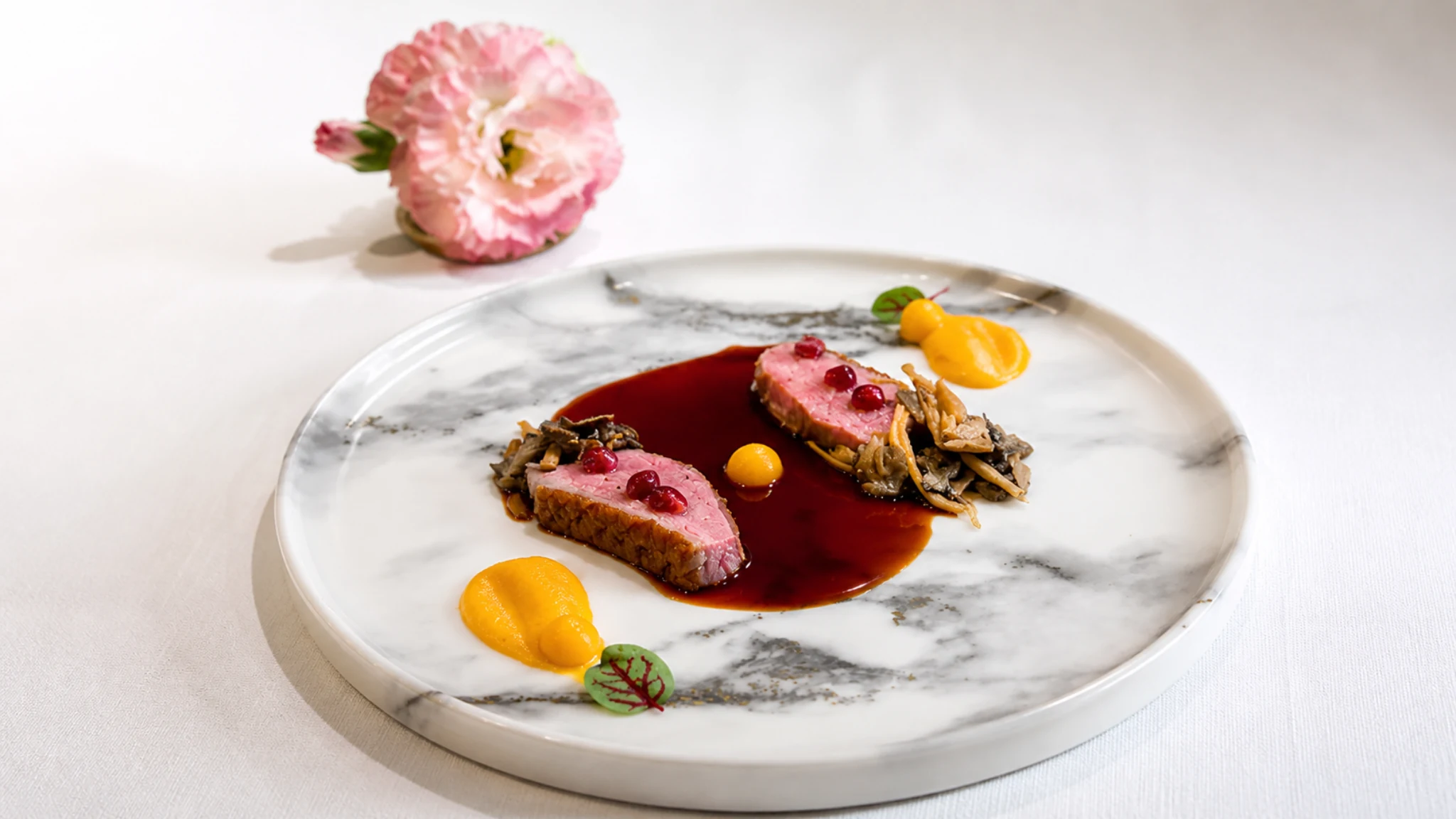 Chez Olivier Tokyo meat course with sauce and vegetables in a French fine dining setting