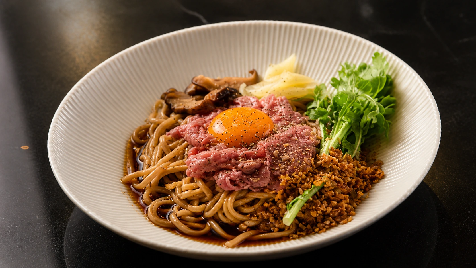 Tsuta Tokyo noodle bowl with egg yolk, minced meat, and greens