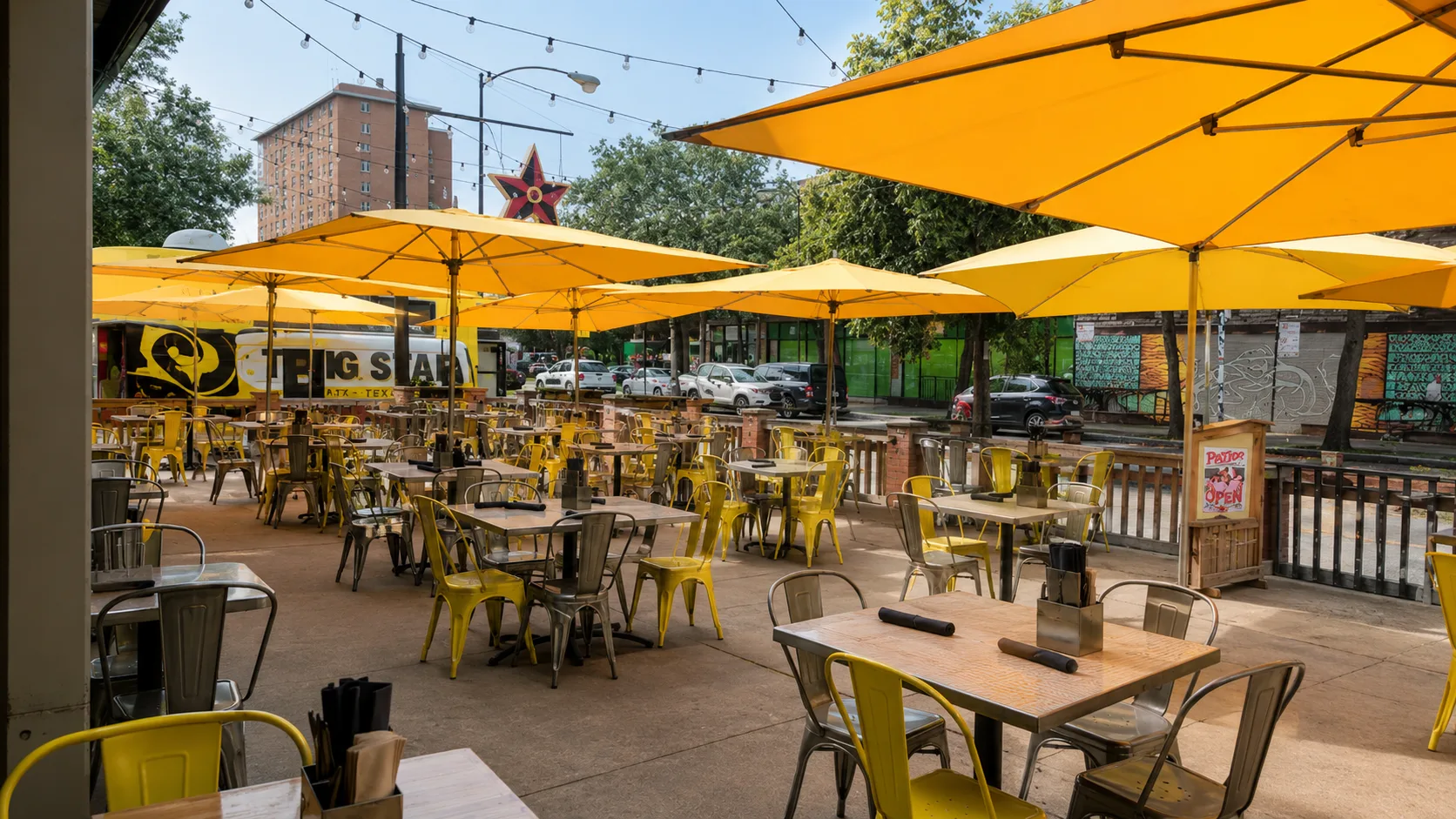 Yellow umbrella patio seating at Big Star in Wicker Park Chicago