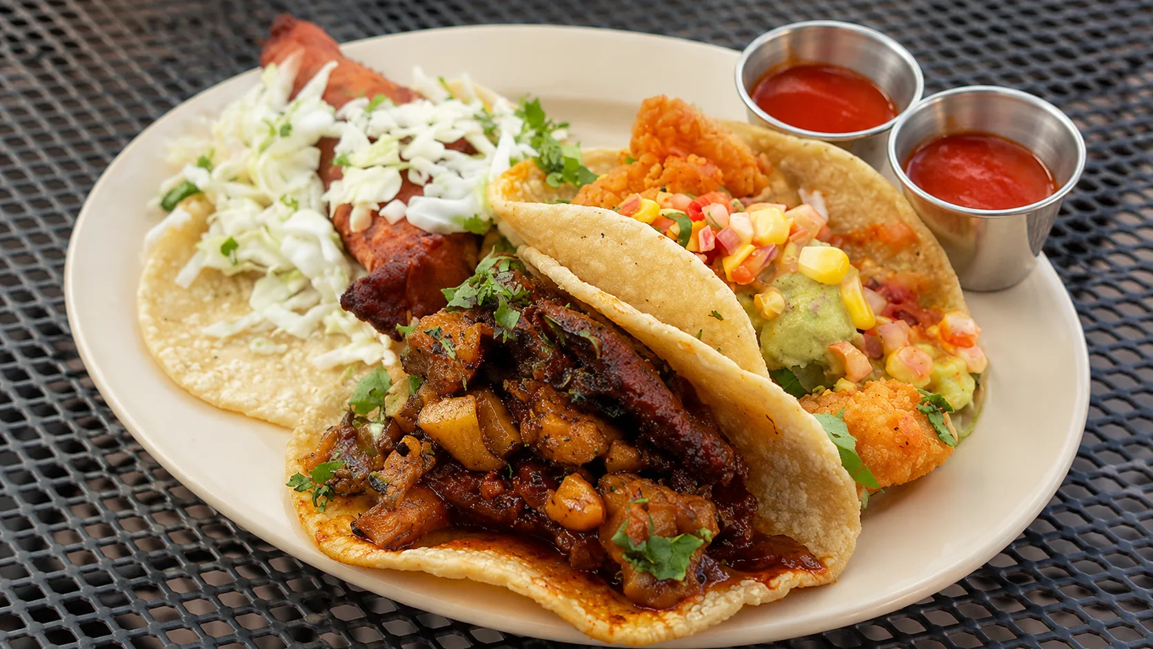 Tacos and salsa on a patio table at Big Star Chicago