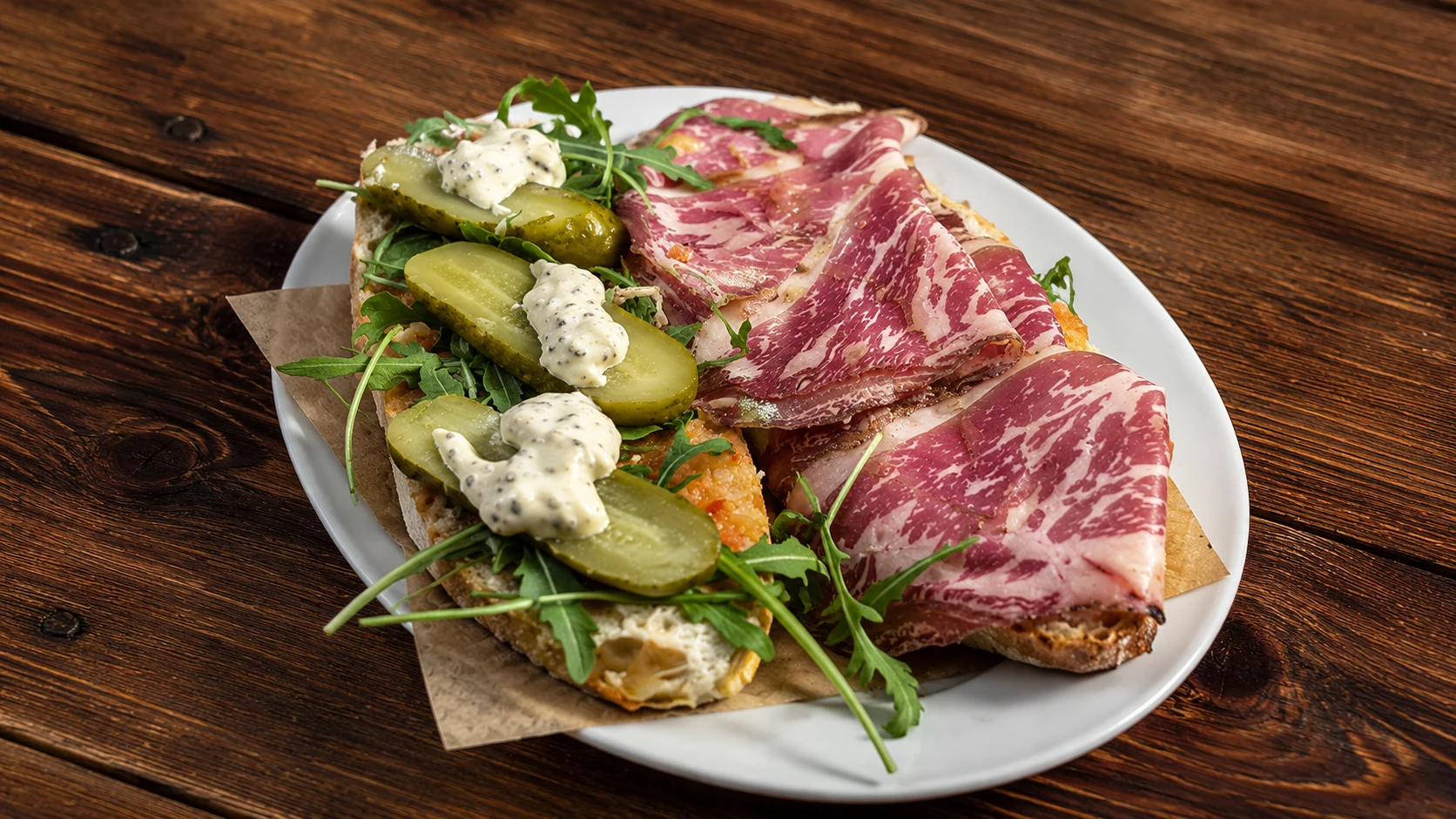 Bodega Montferry Barcelona charcuterie, pickles, burrata, and tapas plate