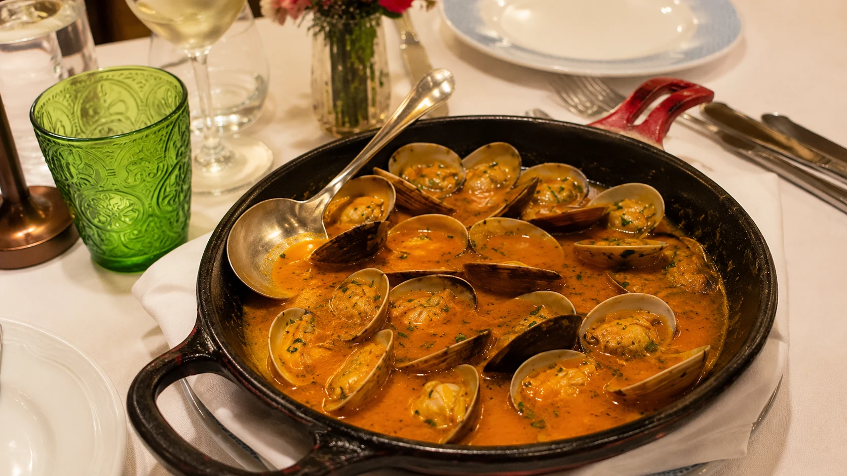 Botafumeiro Barcelona seafood dinner table with lobster, shellfish, wine, and fish