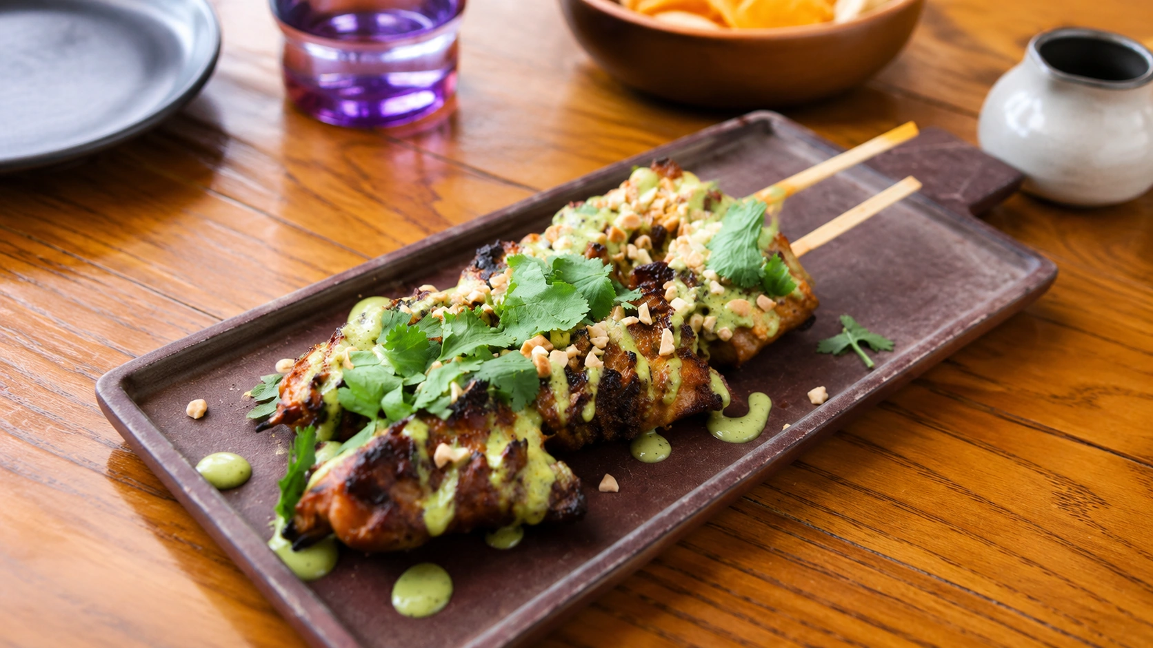 Grilled skewers with cilantro sauce at Cabra in Chicago