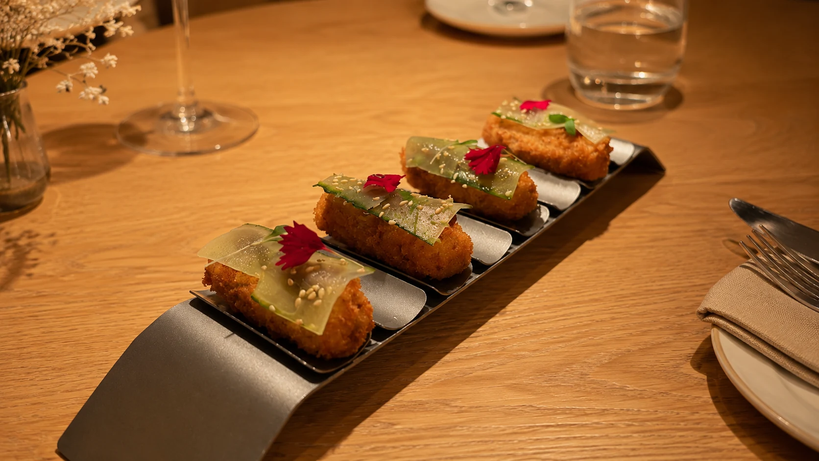 Compartir Barcelona tapas and small plates with sauce and garnish