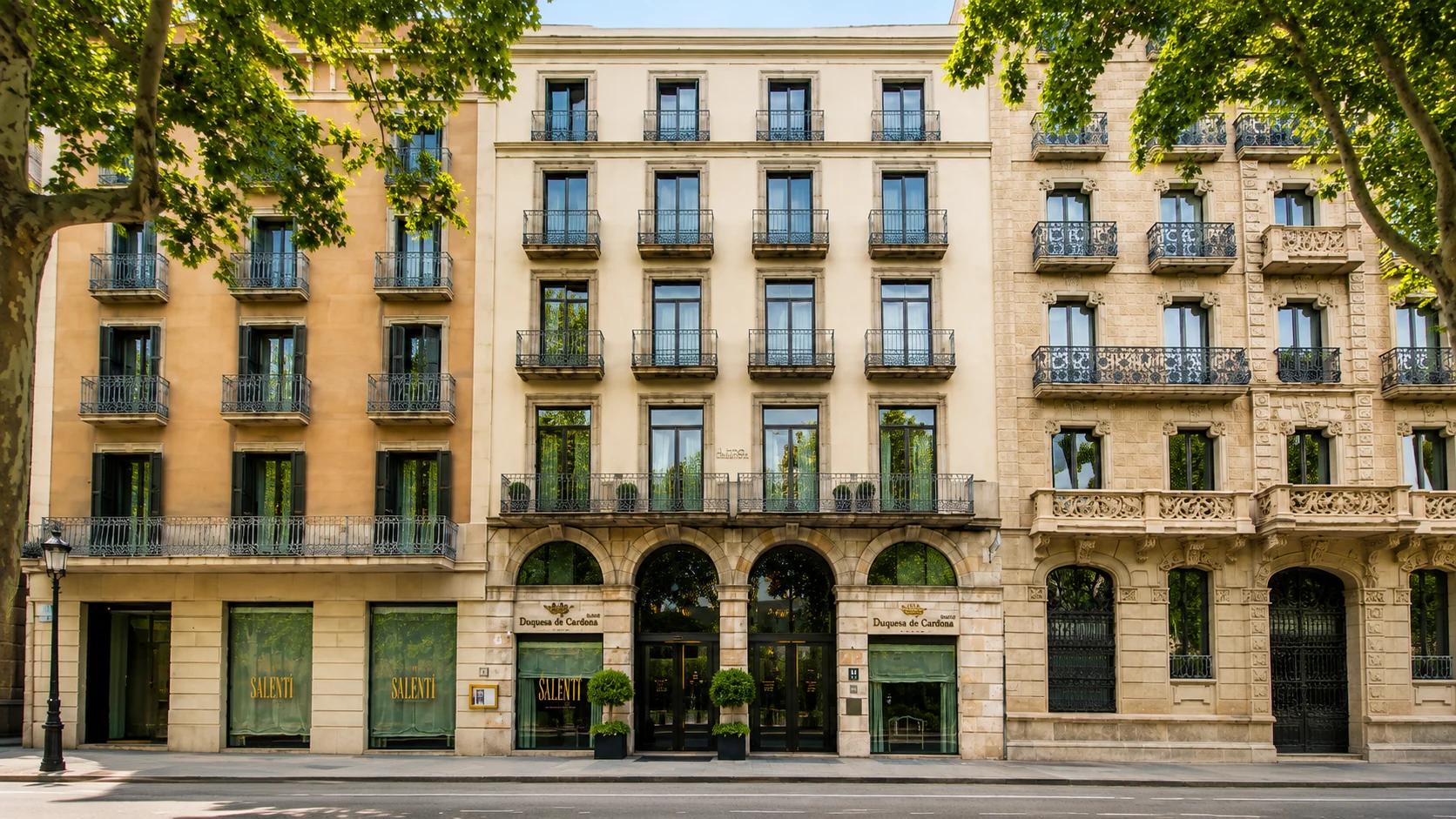 Duquesa de Cardona Barcelona hotel exterior with classic balconies and tree-lined street