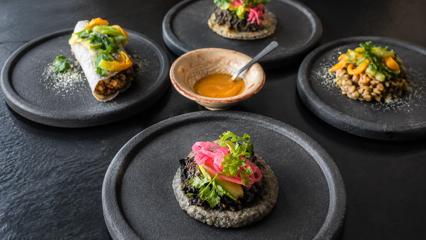 Expendio de Maíz Mexico City masa dishes and antojitos on a rustic table