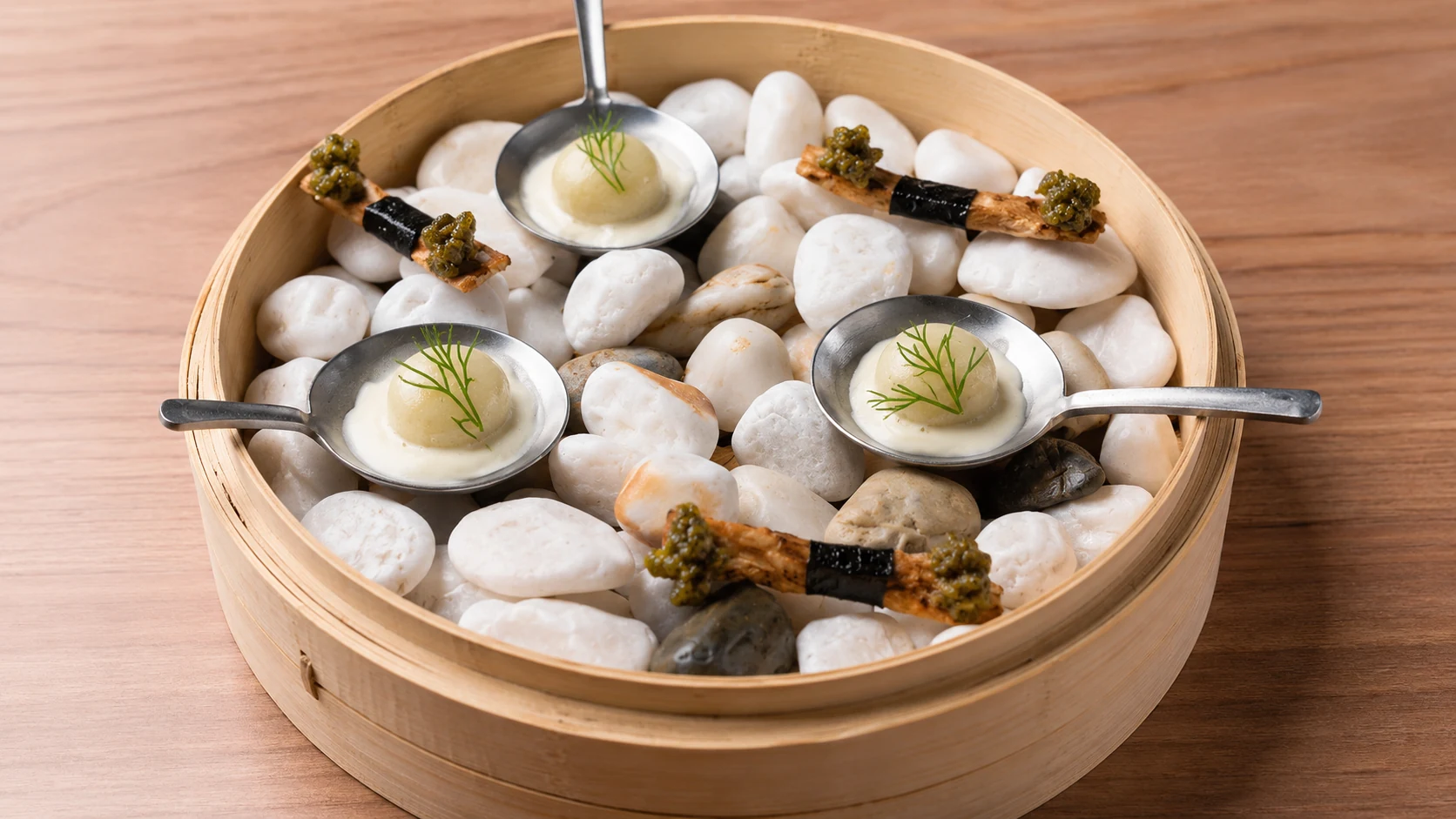 Fishology Barcelona fish dish with sauce and vegetables
