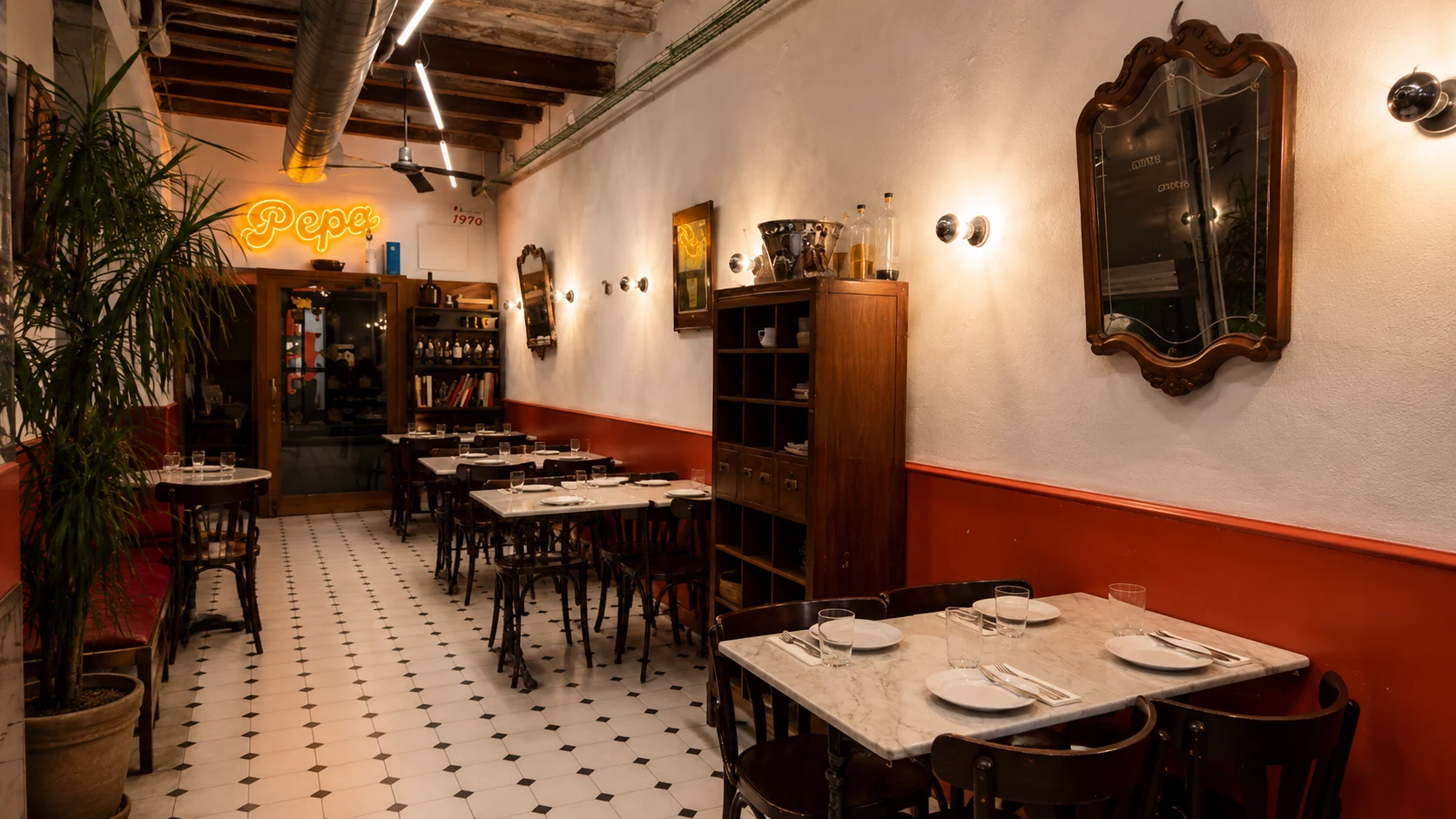 Fonda Pepa Barcelona neighborhood restaurant dining room with warm lighting