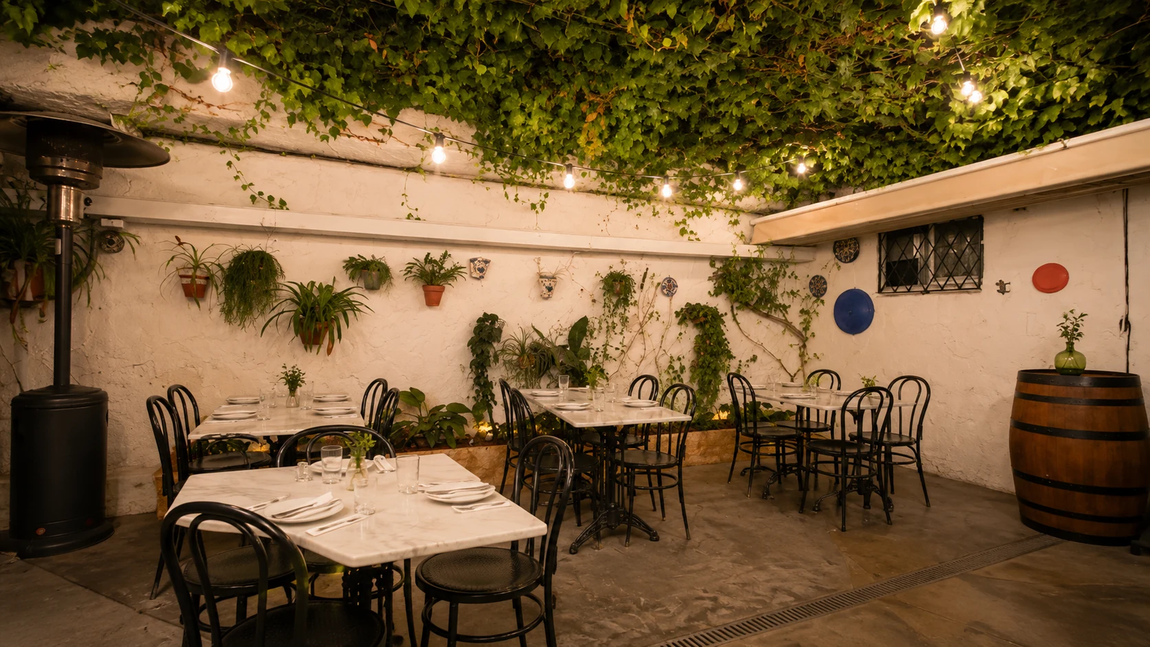 Fonda Pepa Barcelona tapas and small plates with wine on a restaurant table