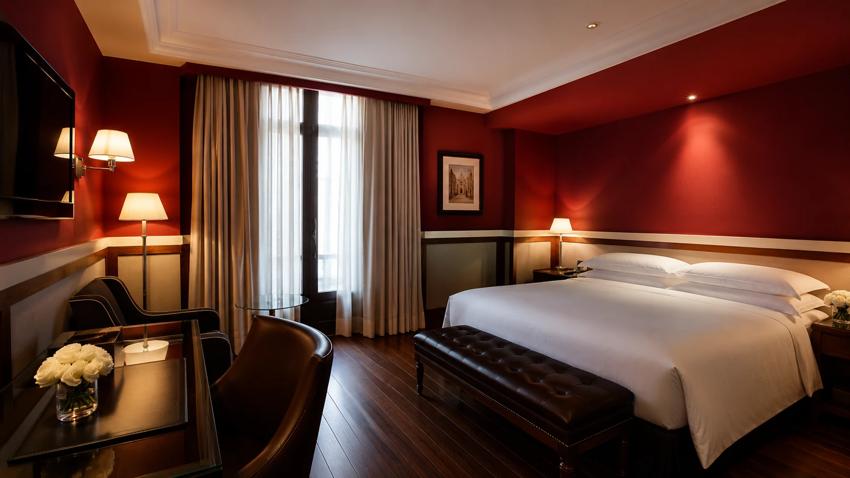 Hotel 1898 Barcelona guest room with rich red walls and classic hotel design
