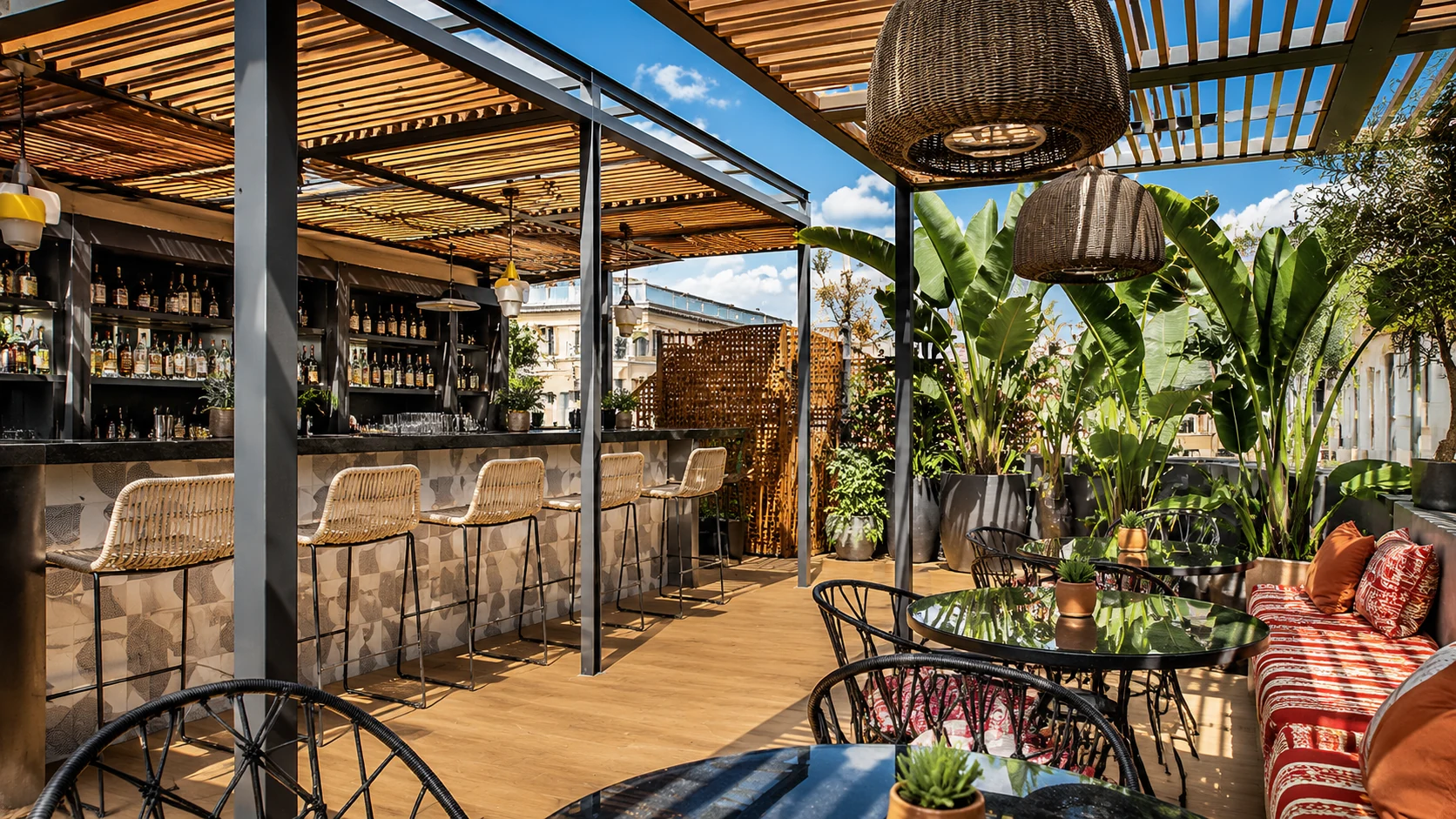 Kimpton Vividora Barcelona hotel bar with warm lighting, leather lounge chairs, and an upscale boutique atmosphere