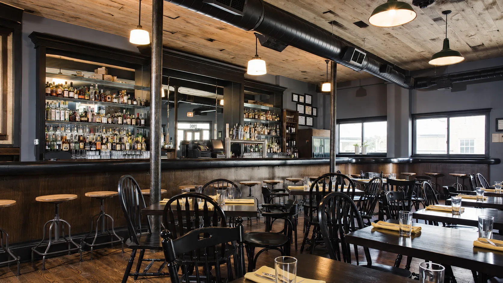 Wood and leather dining room at Longman and Eagle in Logan Square Chicago