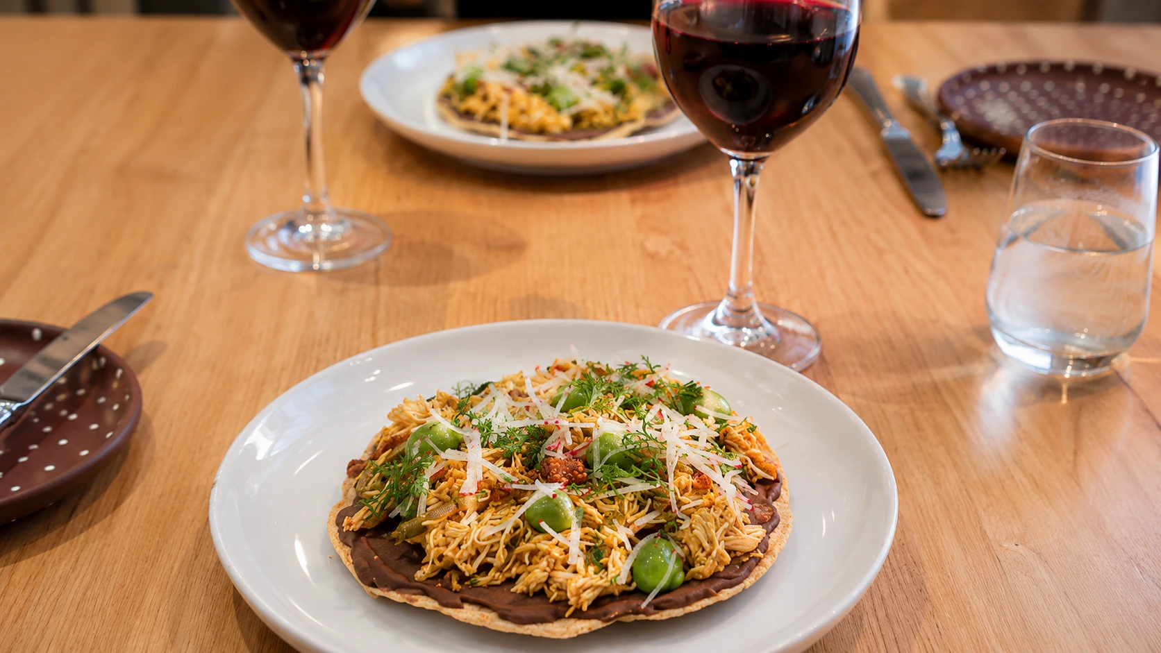 Máximo Mexico City pasta dish with greens and grated cheese
