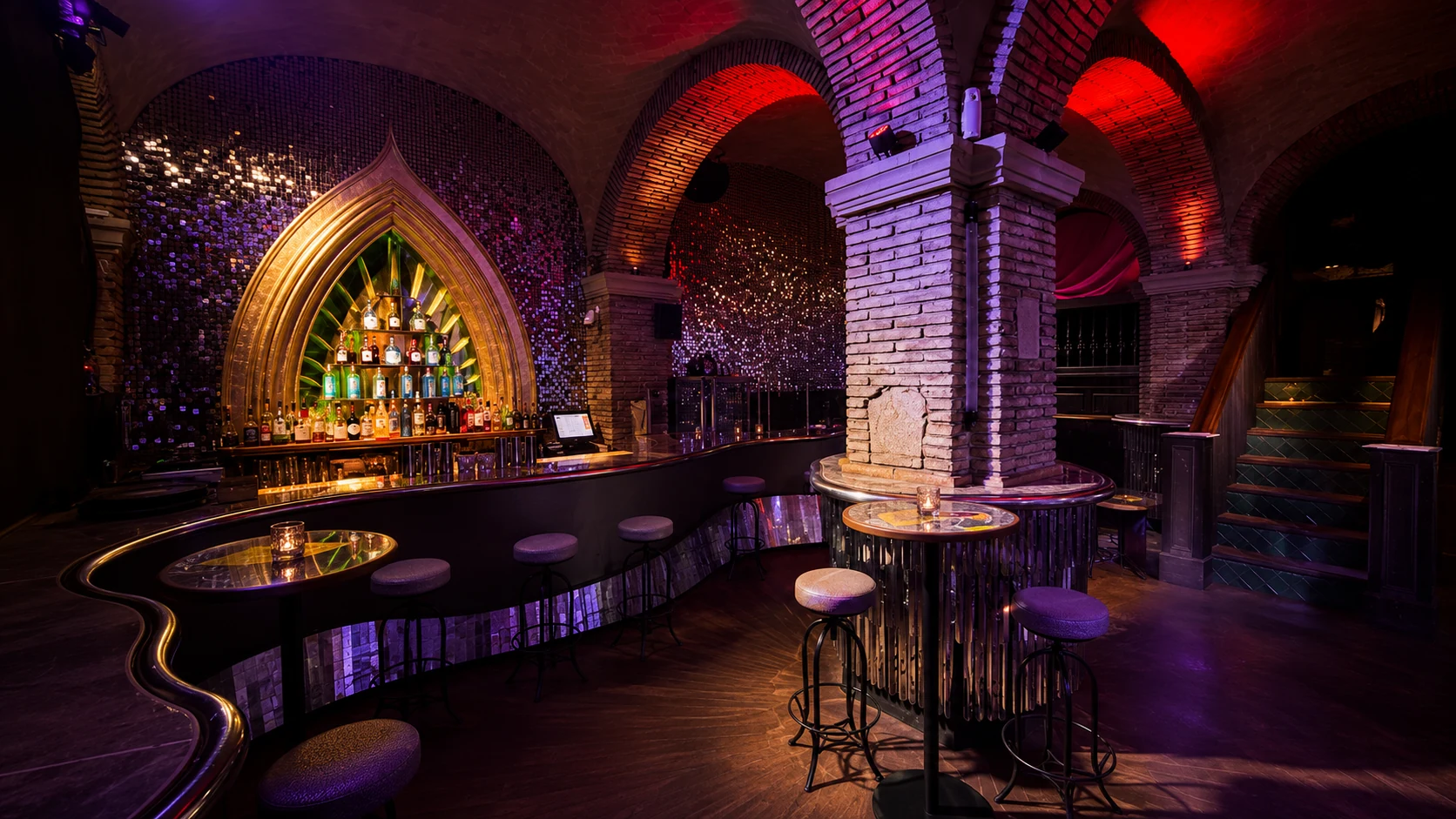 Monk Barcelona cocktail lounge with moody bar seating in El Born
