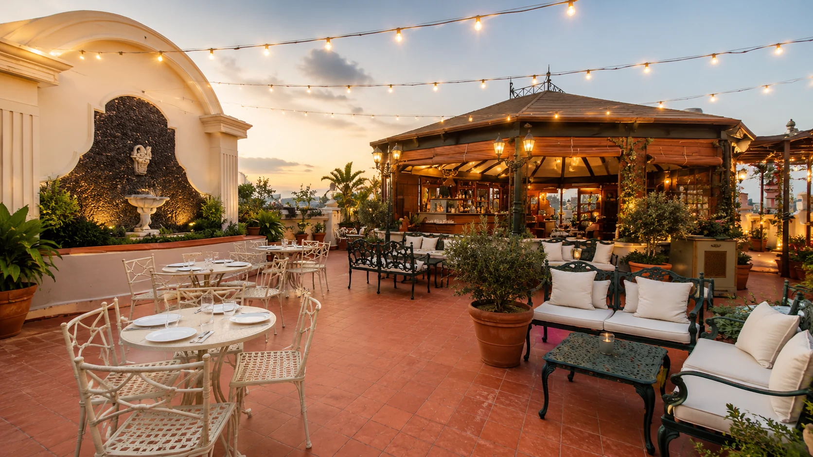 Barcelona rooftop cocktail bar terrace with greenery and city views