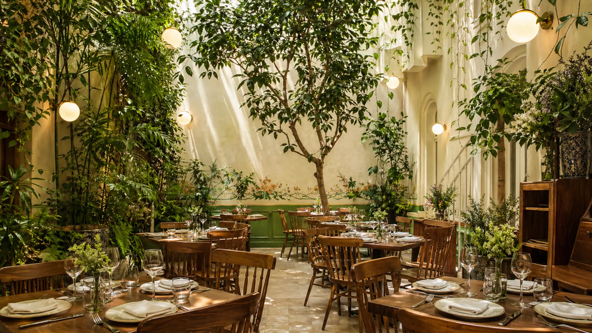 Rosetta Mexico City garden restaurant patio with outdoor fine dining tables