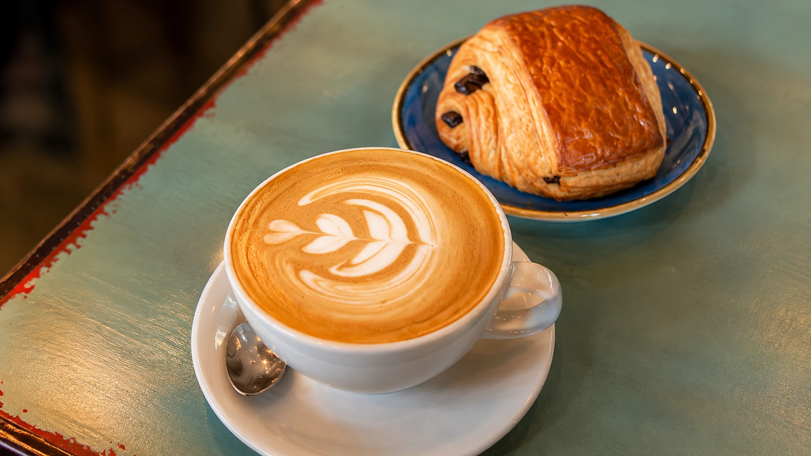Sensorio Coffee Lab Rome coffee, pastry, and small breakfast plate