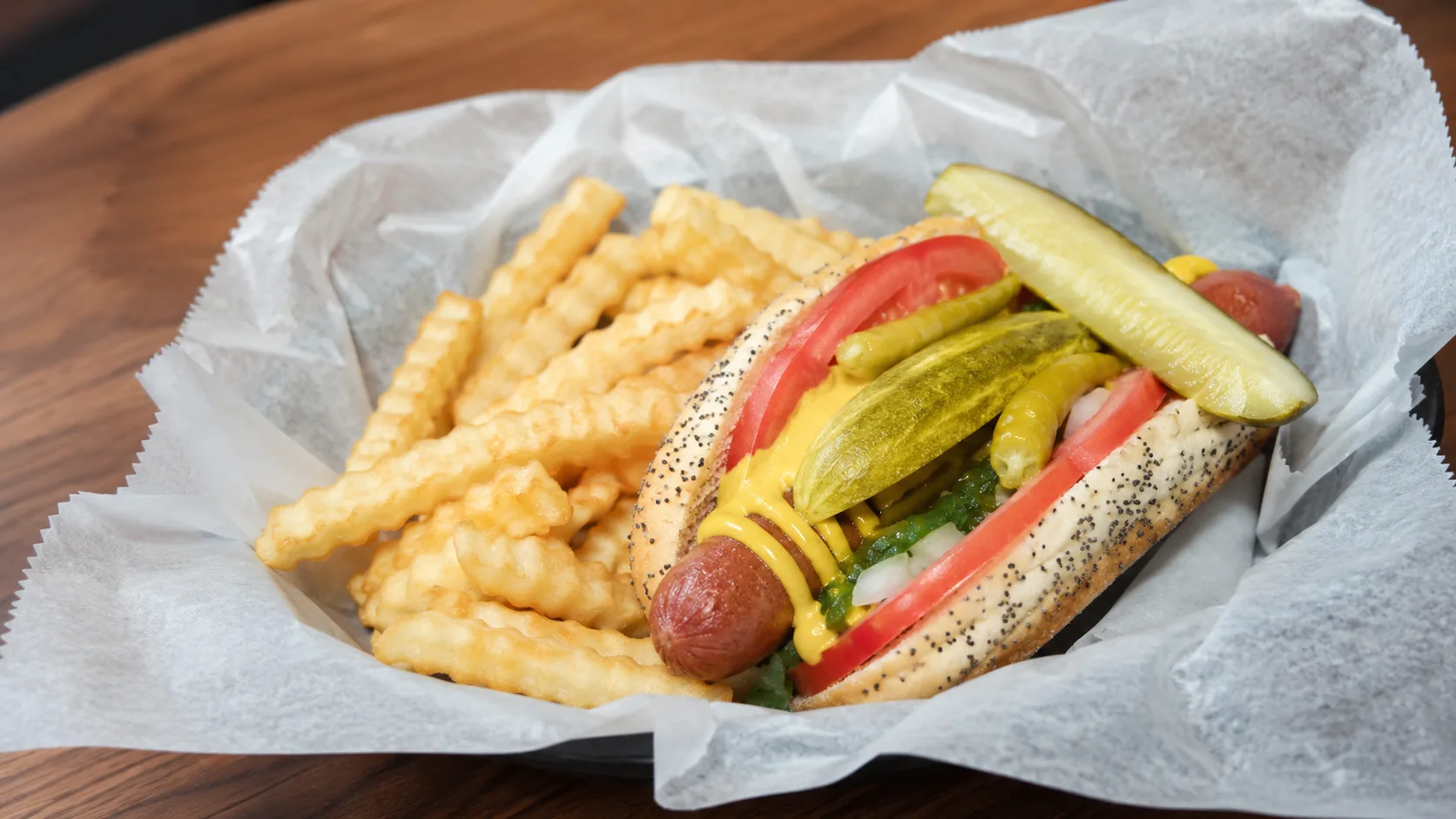 Chicago hot dog with fries at The Hat in Chicago