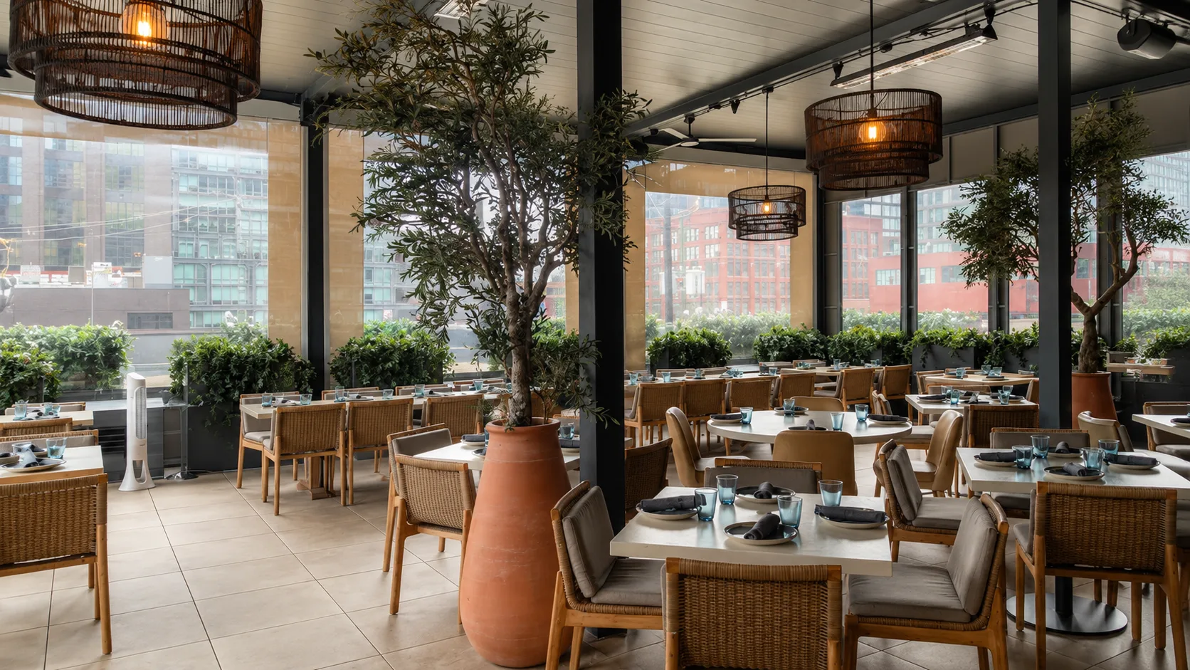 Bright dining room with greenery at The Oakville Grill and Cellar in Chicago