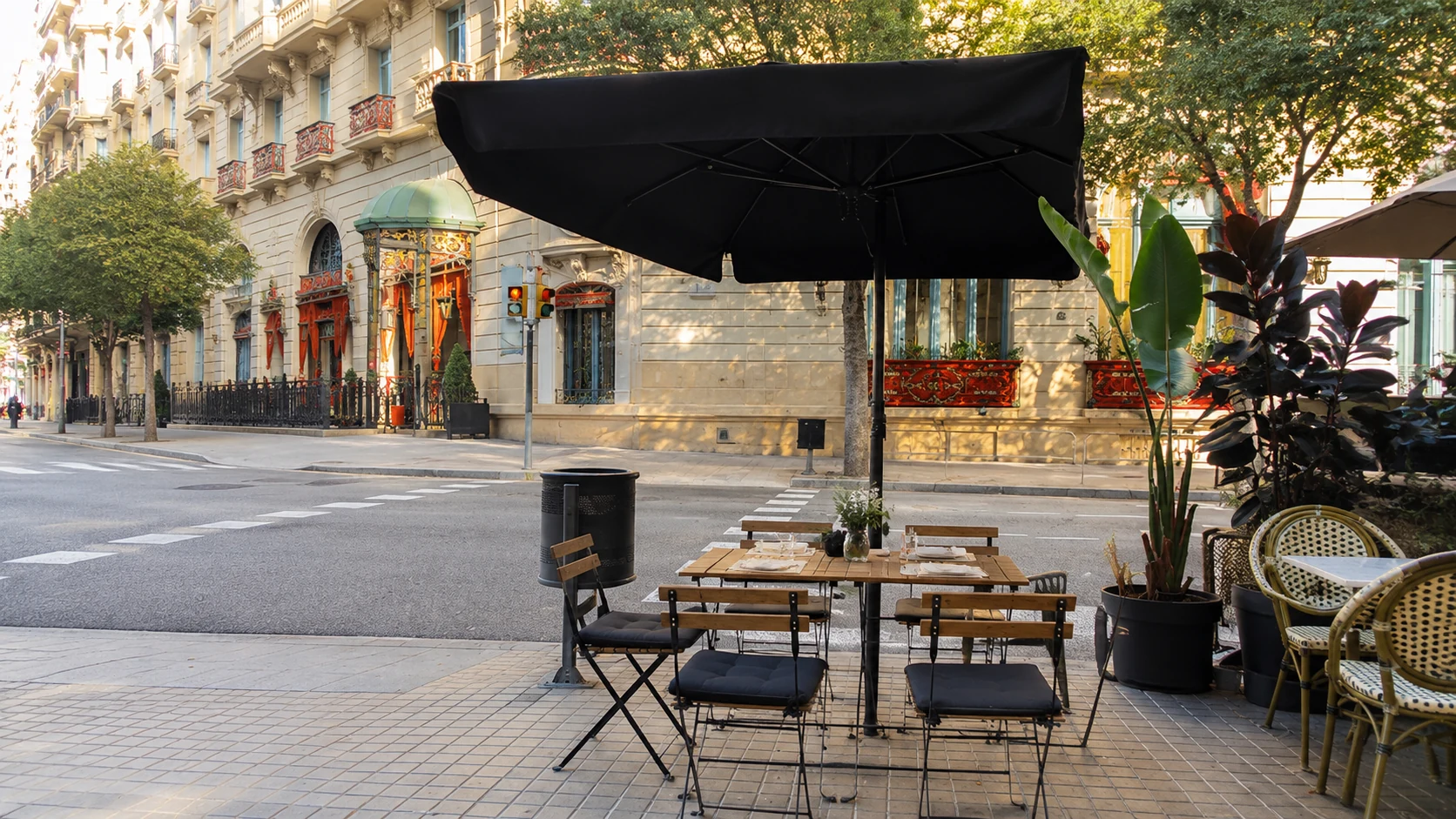 Villa Bakery Barcelona sidewalk cafe terrace with outdoor tables